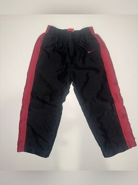 y2k Nike Kids Black and Red striped Athletic Track Pants. size 5. stretch waist
